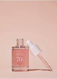 Anua Peach 70% Niacinamide Serum, a skincare product designed to brighten and improve skin texture.