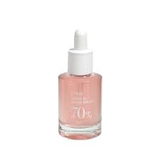 Anua Peach 70% Niacinamide Serum, a skincare product designed to brighten and improve skin texture.